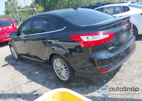 2014 Ford Focus Titanium from USA, damaged, VIN 1FADP3J23EL429773